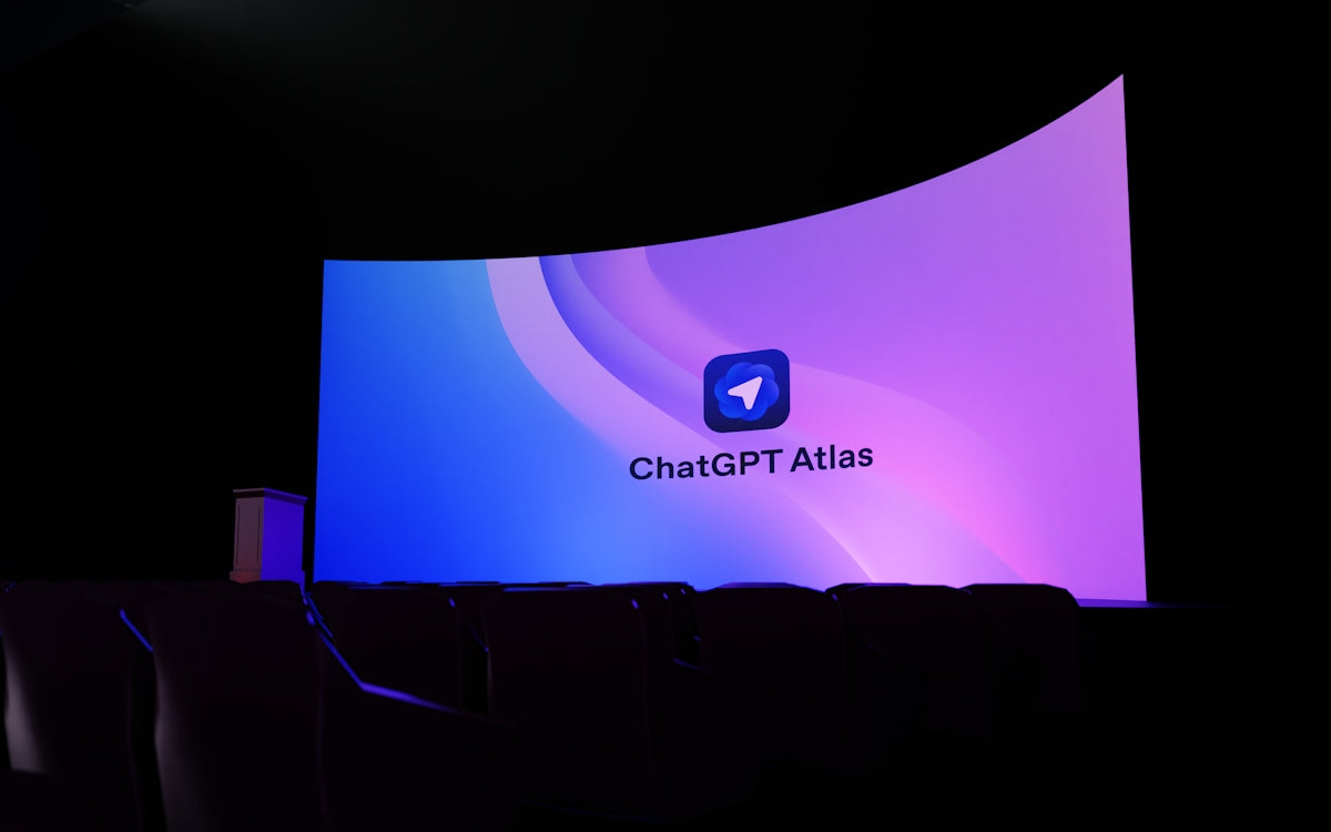 Large screen displaying chatgpt atlas logo